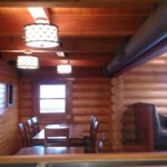 Interior log home blasting and stain by wildwood log home restoration.