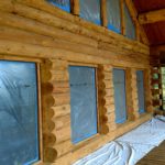 Glass blasted log home showing natural wood grain.