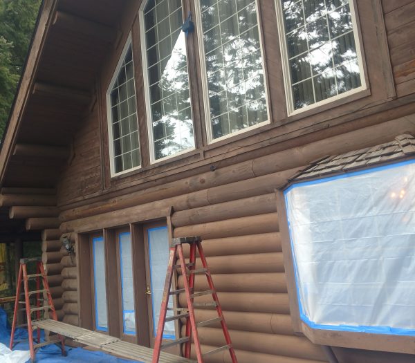 Log home in the pacific northwest needing glass blasting, chinking, and staining.